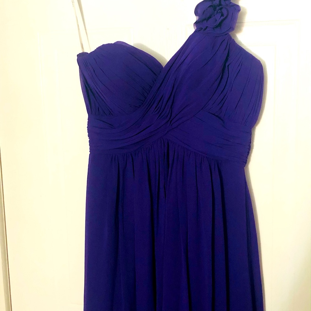 Royal purple gown. The size & brand is shown in a picture.